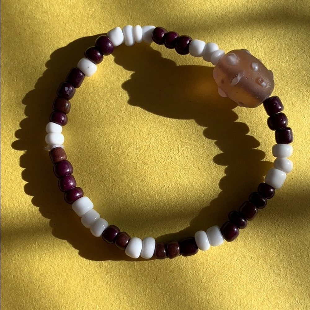 purple/white bracelet